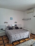 Quarto em casa compartilhada