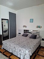 Quarto em casa compartilhada