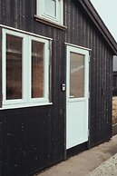 Lítlastova | A Charming Boathouse Getaway