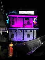 Goroomgo Hikers World Dharamshala