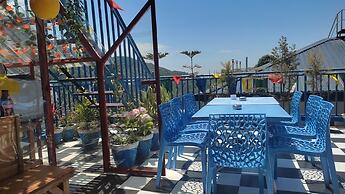 Goroomgo Hikers World Dharamshala