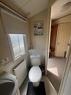 Cozy Cabin Retreat in Towyn