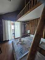 Tambayan Rooms & Cottages by SMS Hospitality