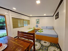 Tambayan Rooms & Cottages