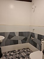 Tambayan Rooms & Cottages by SMS Hospitality