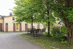 A bright wooden studio for four