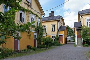 A bright wooden studio for four