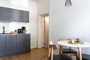 A bright wooden studio for four