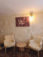ASMA CAVE HOUSE