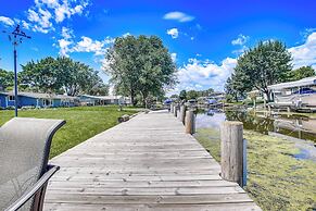 Oshkosh Canal-front Home w/ Sunroom & Watercraft!