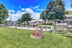 Oshkosh Canal-front Home w/ Sunroom & Watercraft!