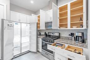 Elegant Townhome Near Disney â Private Suites! 4 Bedroom Townhouse by 