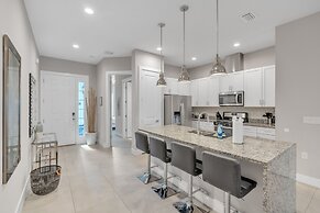 Elegant Townhome Near Disney â Private Suites! 4 Bedroom Townhouse by 