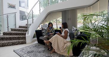 ANEW Hotel & Convention Centre OR Tambo