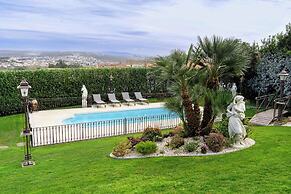 Elegância & Carros Hotel