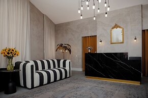 Glória Suites Hotel