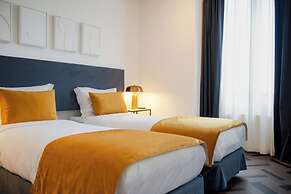 Glória Suites Hotel