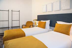 Glória Suites Hotel