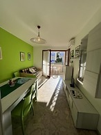 Flat in a Building Surrounded by a Garden