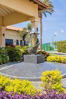 Upscale Gated Community Oasis Close to the Beach