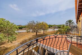 Upscale Gated Community Oasis Close to the Beach