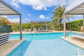 Serene Designer Gem Walk to Beach Strip Pool