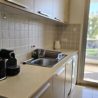 118 LCA - Stay White Petals Apartment