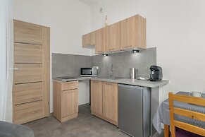 Grey and Beige Poznan Studio by Renters