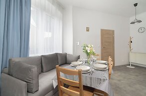 Poznan Stylish Grey Apartment by Renters