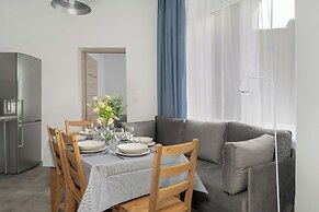 Poznan Stylish Grey Apartment by Renters