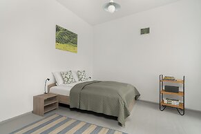 Poznan Stylish Grey Apartment by Renters