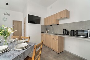 Poznan Stylish Grey Apartment by Renters