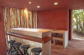 Hotel Caimán Habitat Tulum Beach