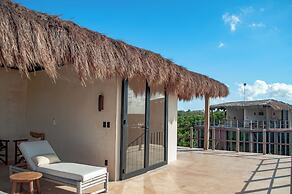 Hotel Caimán Habitat Tulum Beach