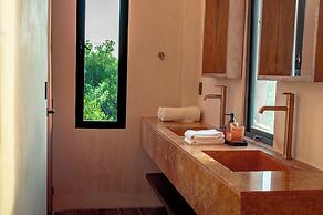 Hotel Caimán Habitat Tulum Beach