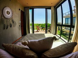 Hotel Caimán Habitat Tulum Beach