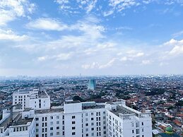 Warm And Homey 2Br At Bassura City Apartment