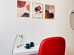 Moderno Bilocale con Terrazzo e Parcheggio