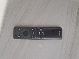 Moderno Bilocale con Terrazzo e Parcheggio