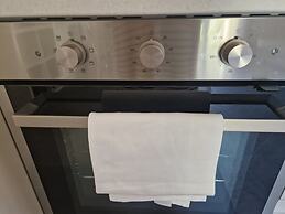 Moderno Bilocale con Terrazzo e Parcheggio