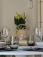 Moderno Bilocale con Terrazzo e Parcheggio