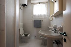 Bright Apartment Just Steps From the Beach