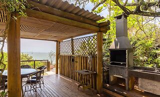 JBM Apto pé na areia com vista mar