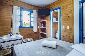 PRJ Cabanas sossegadas na praia do Rosa