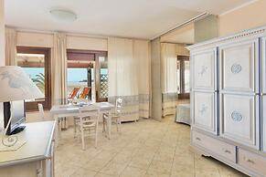 Residence with private beach in Bosa Marina