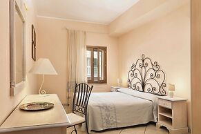 Residence with private beach in Bosa Marina