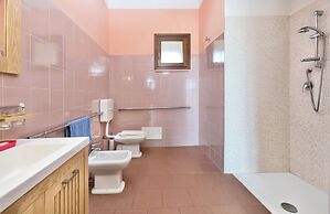 Residence with private beach in Bosa Marina