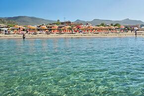 Residence with private beach in Bosa Marina