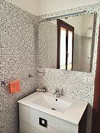 Residence with private beach in Bosa Marina