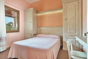 Residence with private beach in Bosa Marina